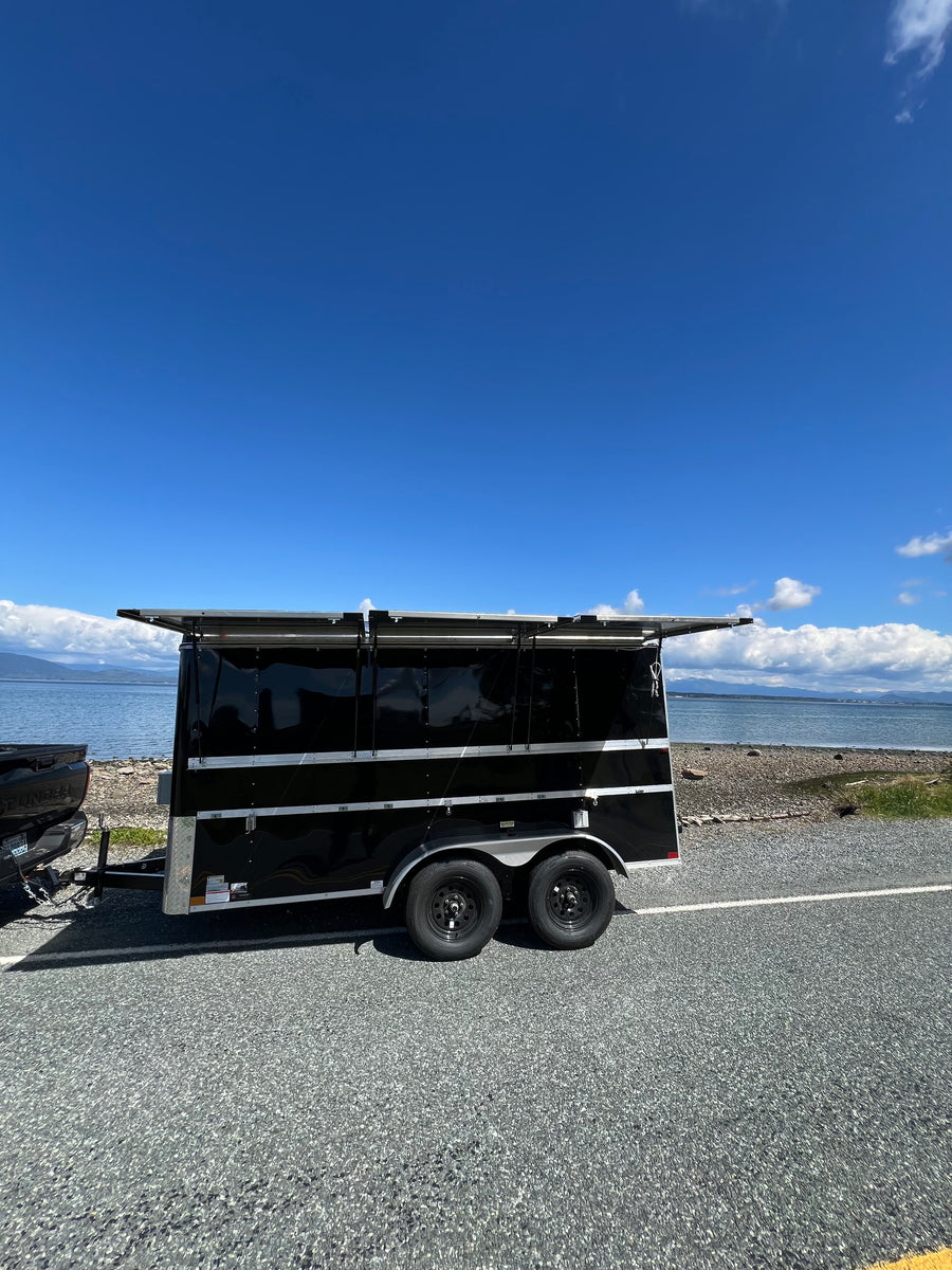 SunWing solar trailer deployed at a remote field site